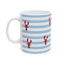 Light blue stripe mug with red lobsters on it.