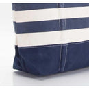 photo of side of bag with stripes and bottom of  canvas bag.